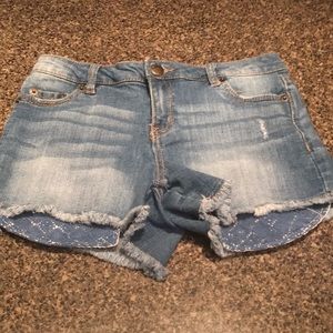 Very short light blue jean shorts